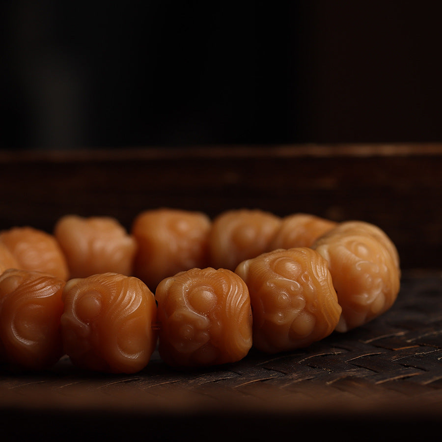 Awakening Lion Bracelet Hand-Carved from Weathered Bodhi Beads