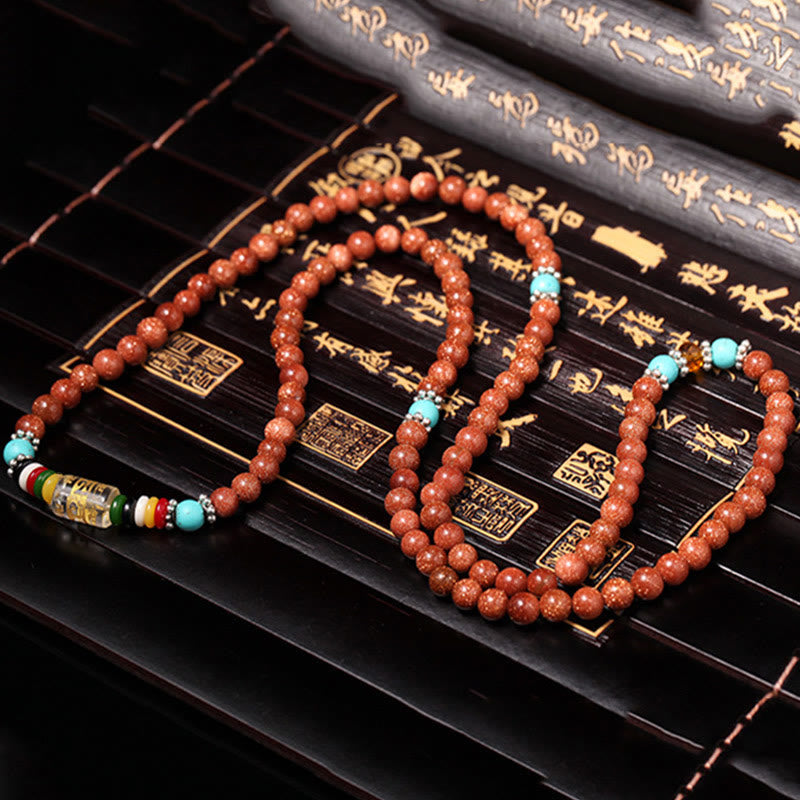 Wear FengShui 108 Mala Beads Goldstone Om Mani Padme Hum Swastika Confidence Bracelet