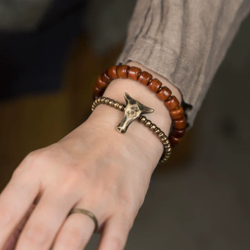 Tibetan Handmade Double-Wrap Yak Bone & Brass Bull Head Bracelet · Primal Strength, Sacred Grounding