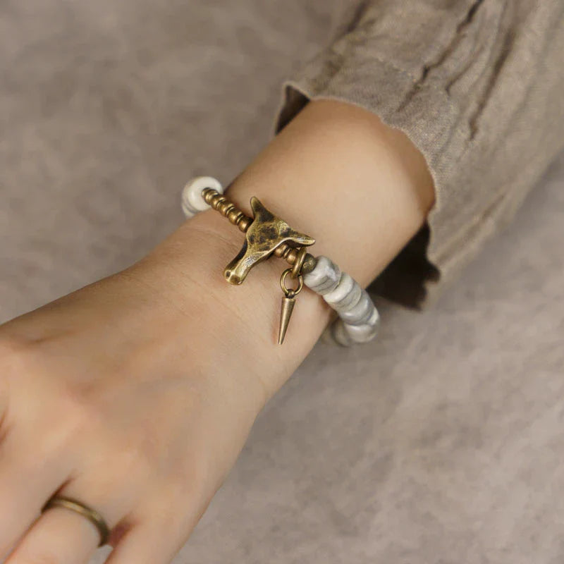 Tibetan Handmade Yak Bone & Brass Bull Head Bracelet · Strength and Spirit