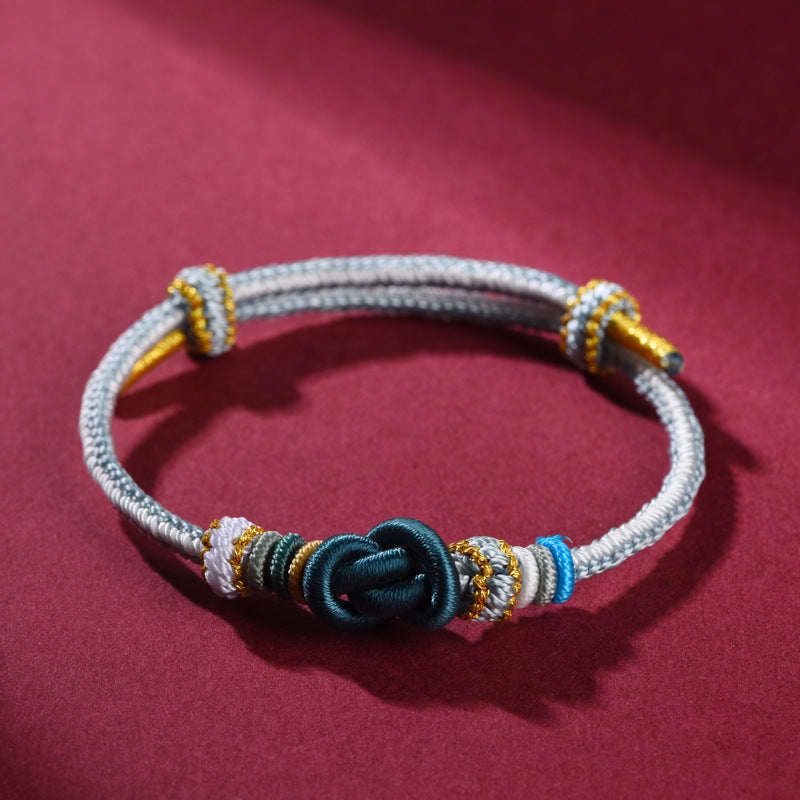 Handmade Red String Bracelet with Ignot Knot – A Good Fortune Amulet